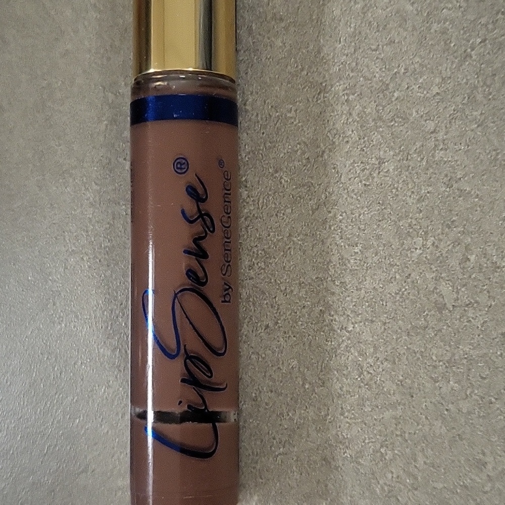 Moisturizing lip gloss, Hazel matte in color, new in pkg